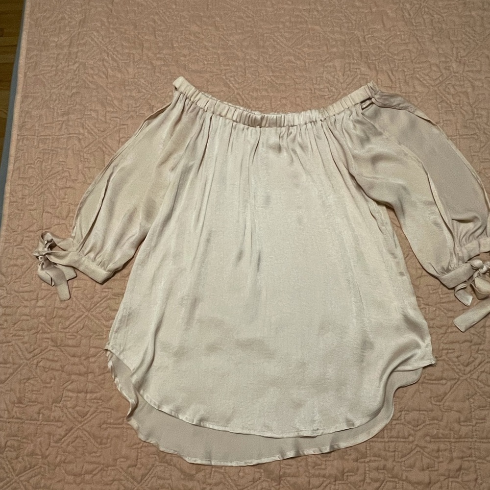 Blush silky style blouse w arm cut outs.